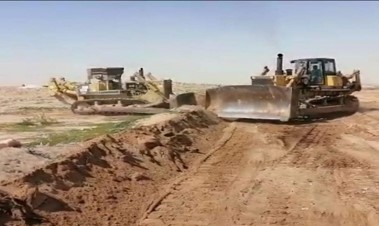 جرافات في أعمال الحفر والتسوية